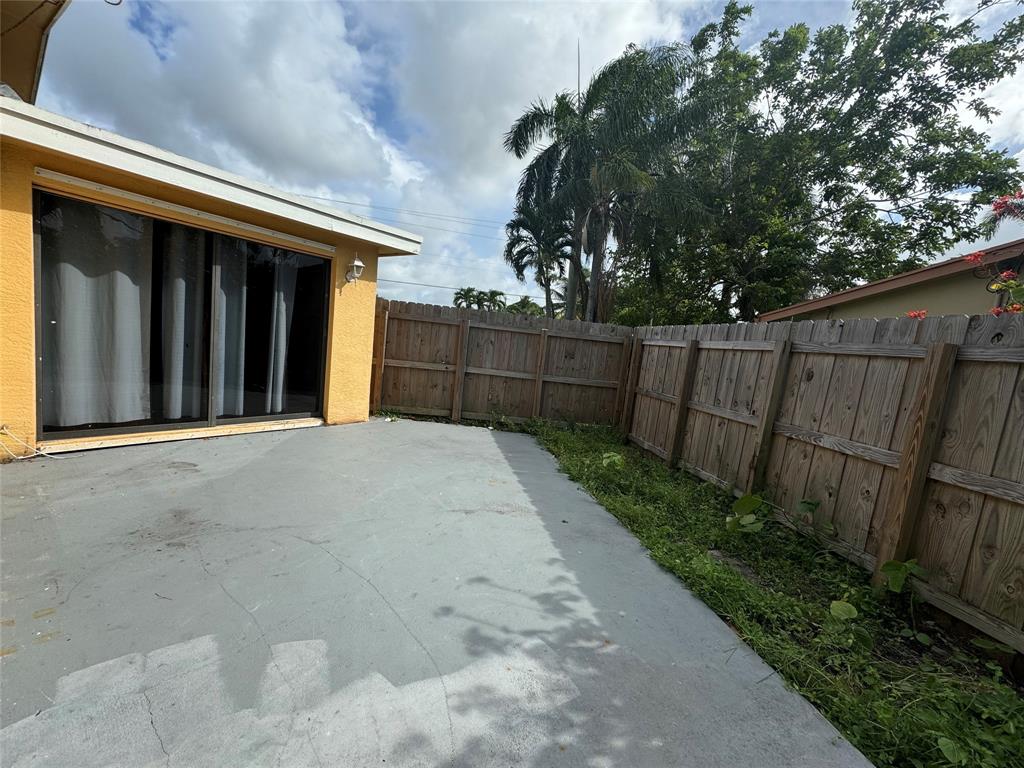 6101 Northwest 18th Street Margate, FL 33063 - Photo 21 of 22 a view of a backyard