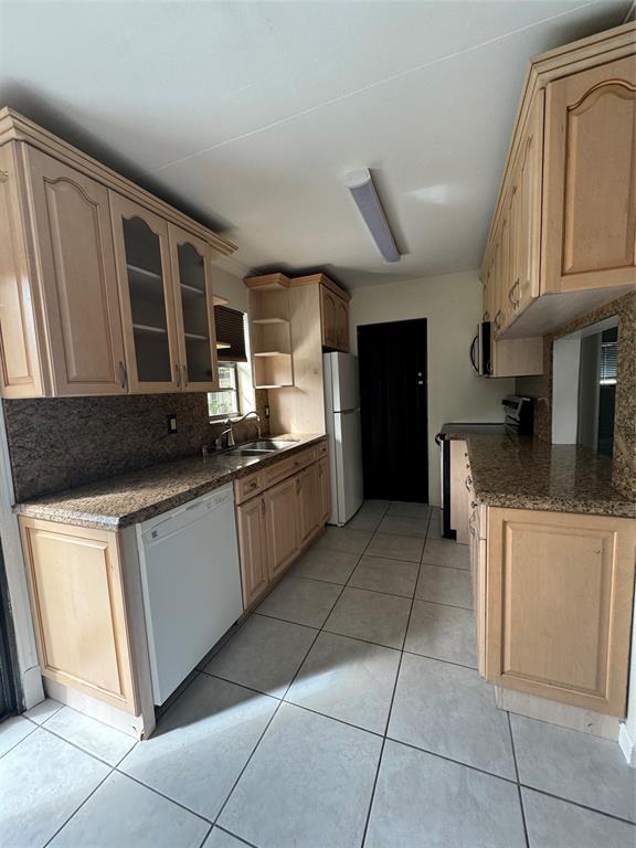 6101 Northwest 18th Street Margate, FL 33063 - Photo 9 of 22 a kitchen with a cabinets and counter space