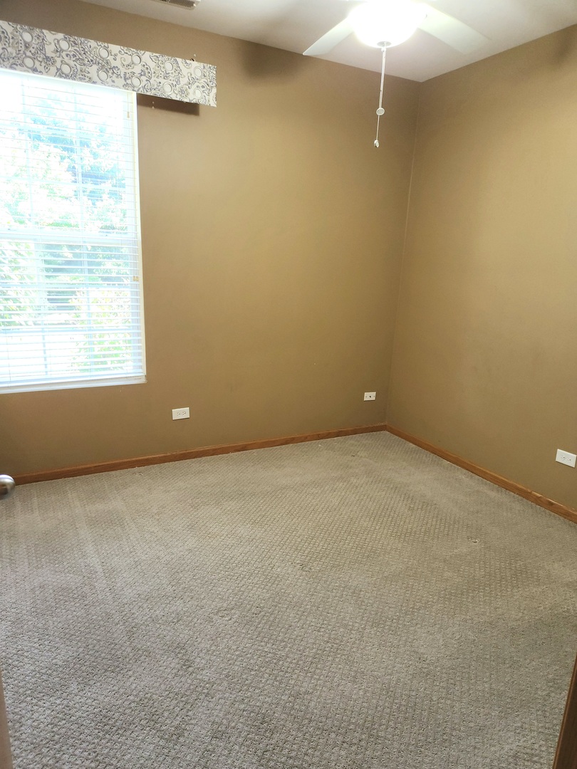 1547 Millbrook Drive Algonquin, IL 60102 - Photo 11 of 17 an empty room with a window