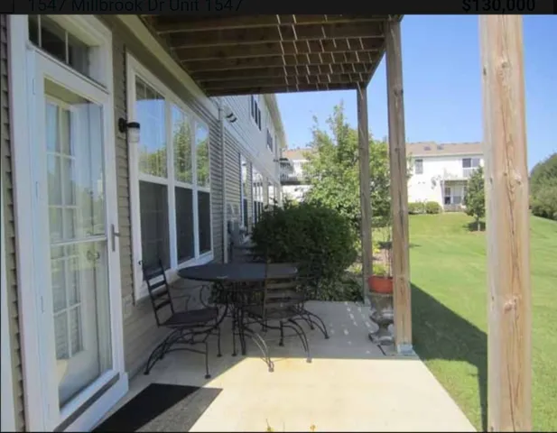 a room with table and chairs