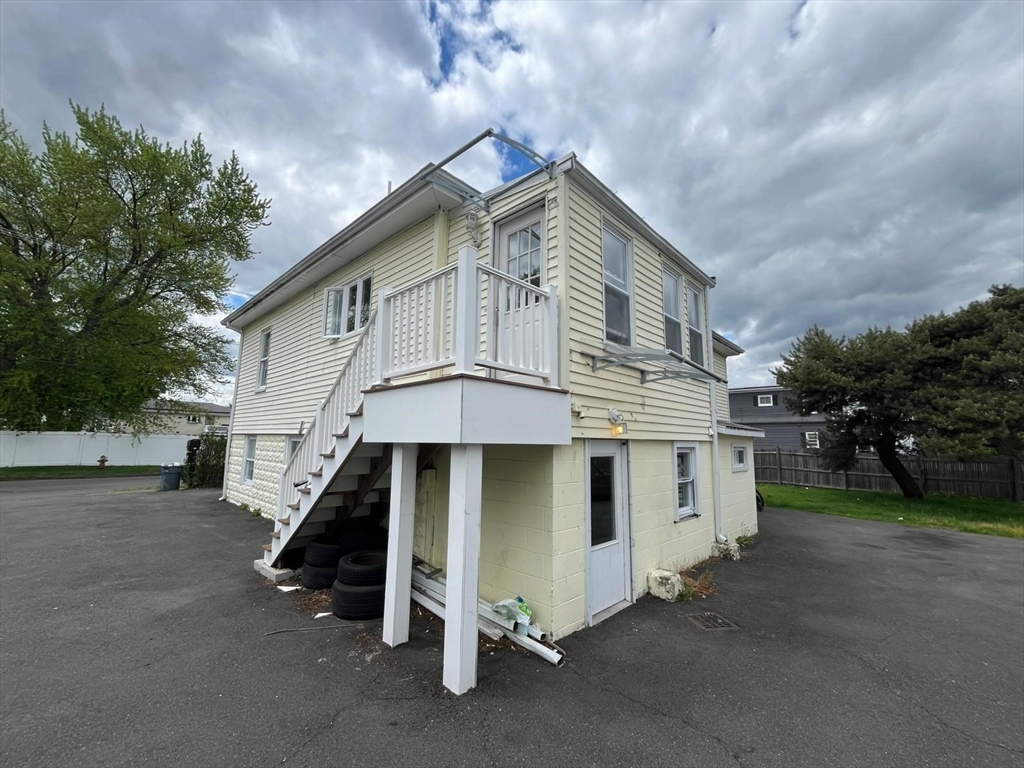 72 Bristow Street Saugus, MA 01906 - Photo 1 of 7 a view of a house with a yard