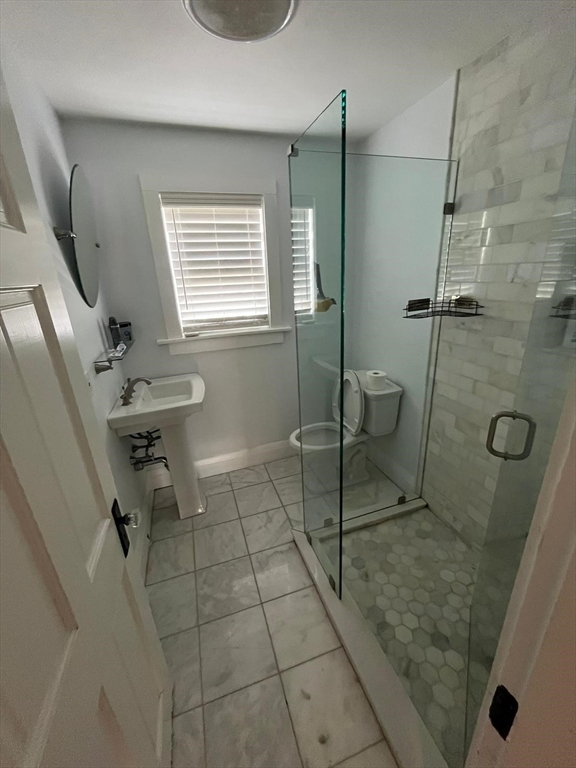 72 Bristow Street Saugus, MA 01906 - Photo 5 of 7 a bathroom with a sink toilet and shower