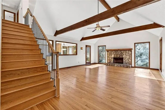 a spacious bathroom with a bathtub and sink