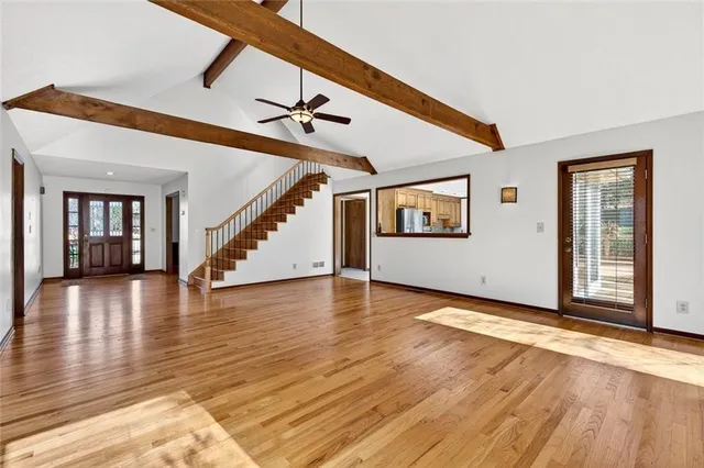 a white bath tub sitting next to a window