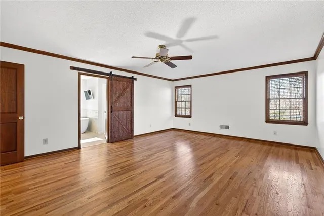a view of a backyard with a patio