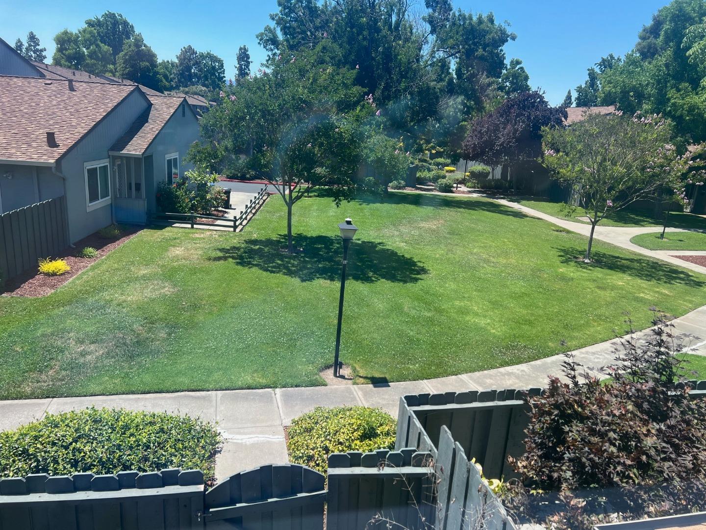 4685 Persimmon Place San Jose, CA 95129 - Photo 8 of 13 a view of a garden with a patio