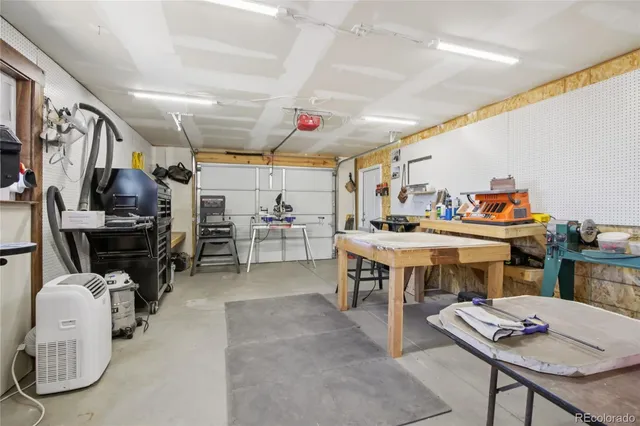 a view of a chairs and tables in the balcony