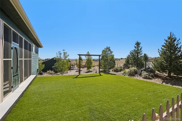 a view of a pathway with a tree
