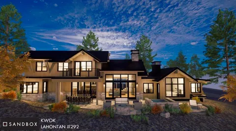 a view of a big house with wooden fence