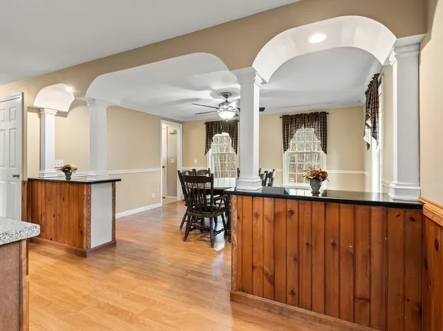 a view of a living room and dining room