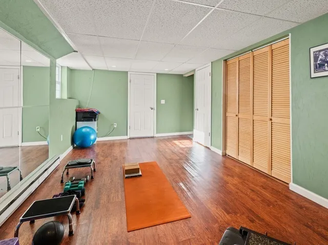 a hallway with wooden floor