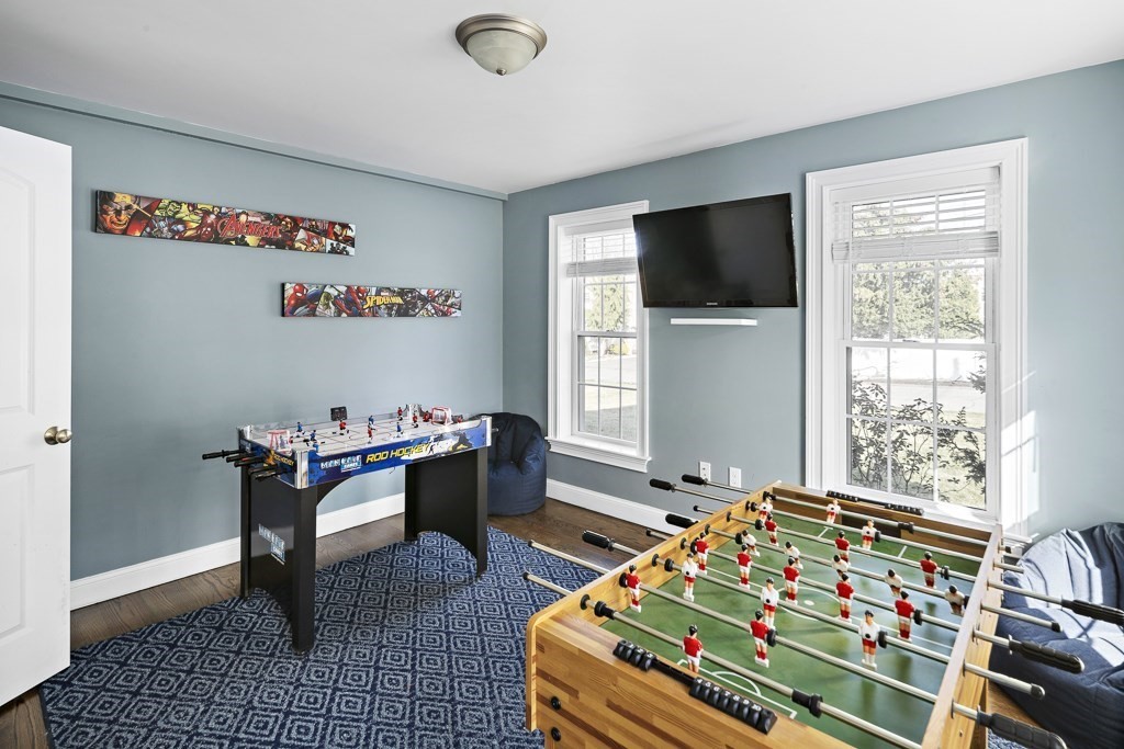 2 Willow Avenue Danvers, MA 01923 - Photo 13 of 42 a living room with furniture and a flat screen tv