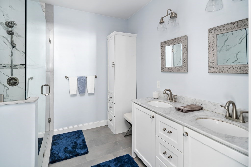 2 Willow Avenue Danvers, MA 01923 - Photo 21 of 42 a bathroom with a sink a toilet and shower