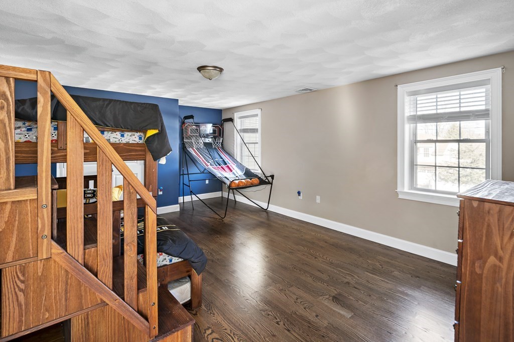 2 Willow Avenue Danvers, MA 01923 - Photo 23 of 42 a view of an entryway with wooden floor and stairs