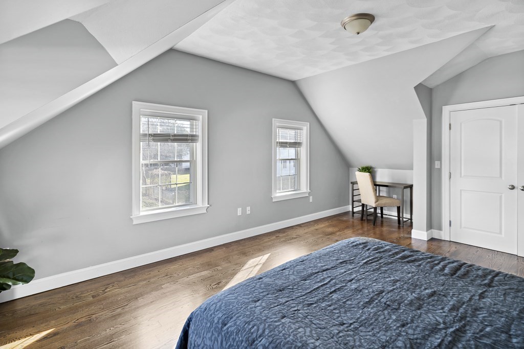 2 Willow Avenue Danvers, MA 01923 - Photo 25 of 42 an empty room with wooden floor and windows