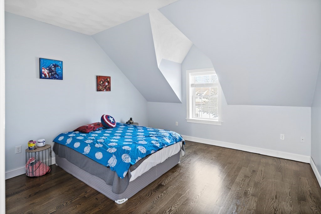 2 Willow Avenue Danvers, MA 01923 - Photo 26 of 42 a bedroom with a bed and window