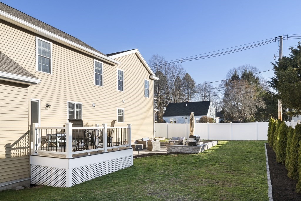 2 Willow Avenue Danvers, MA 01923 - Photo 38 of 42 a view of a house with a yard and furniture