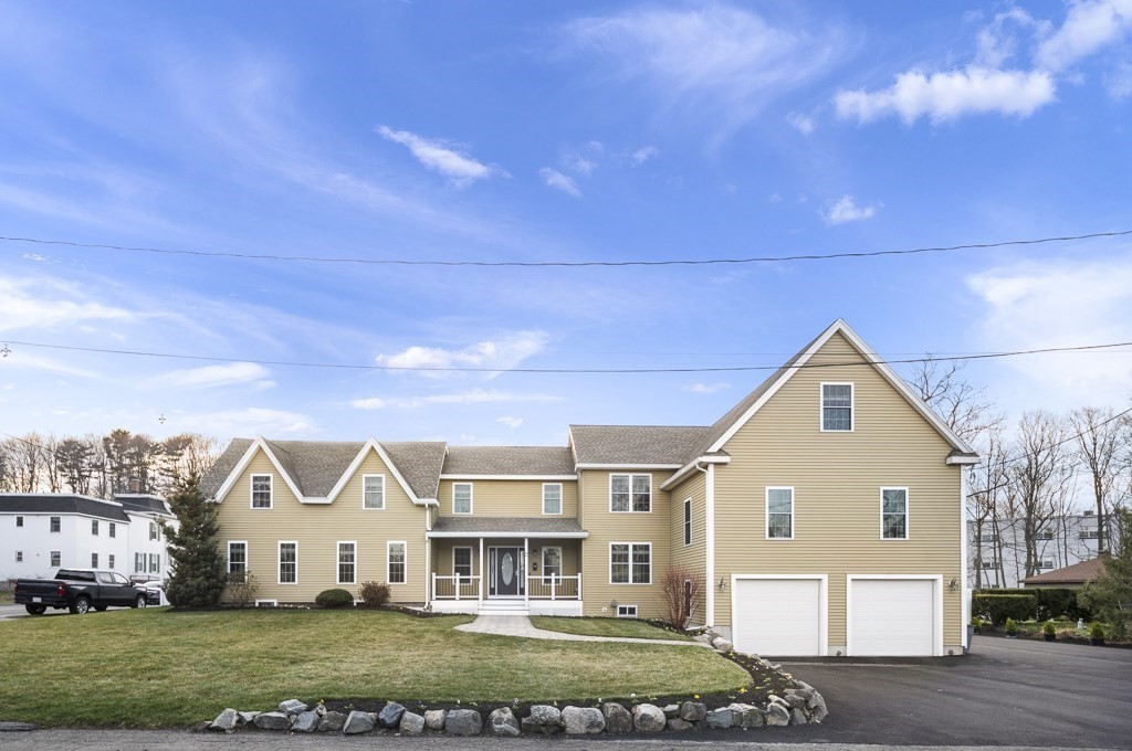 2 Willow Avenue Danvers, MA 01923 - Photo 42 of 42 a front view of a house with a yard