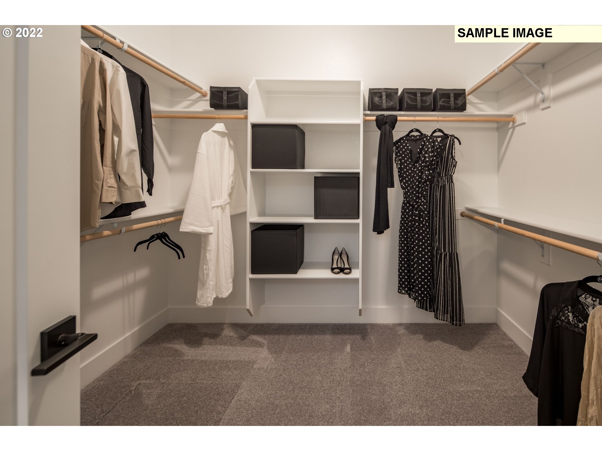 1644 South 51st Place Ridgefield, WA 98642 - Photo 14 of 20 a view of walk in closet with clothes and shoes