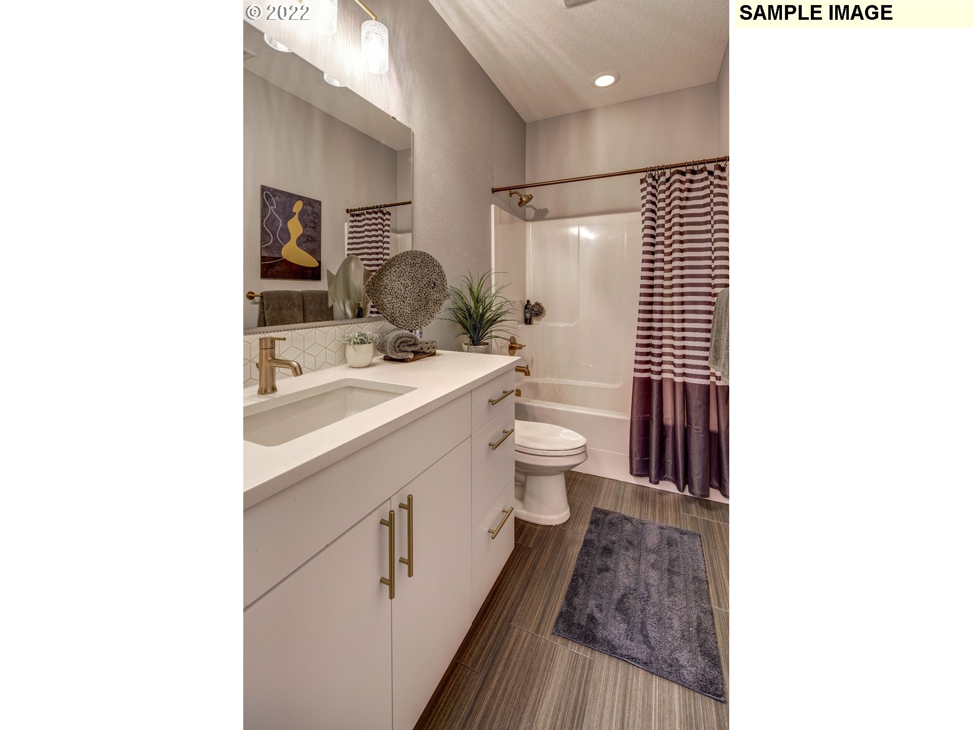 1644 South 51st Place Ridgefield, WA 98642 - Photo 17 of 20 a bathroom with a sink and a mirror