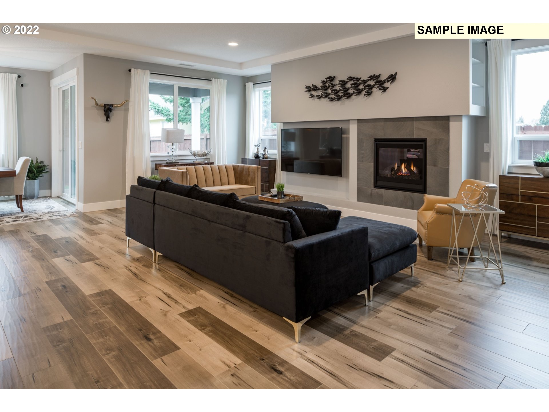 1644 South 51st Place Ridgefield, WA 98642 - Photo 6 of 20 a living room with furniture and a fireplace