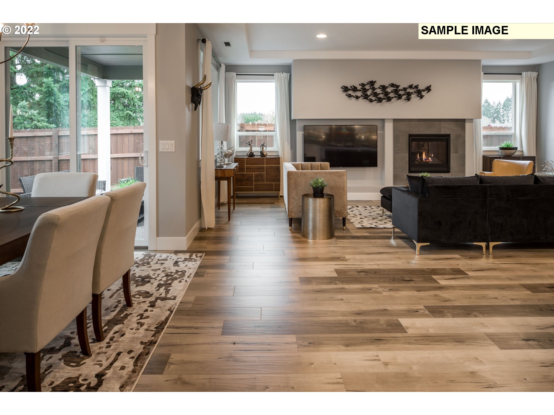 1644 South 51st Place Ridgefield, WA 98642 - Photo 9 of 20 a living room with furniture wooden floor and a fireplace