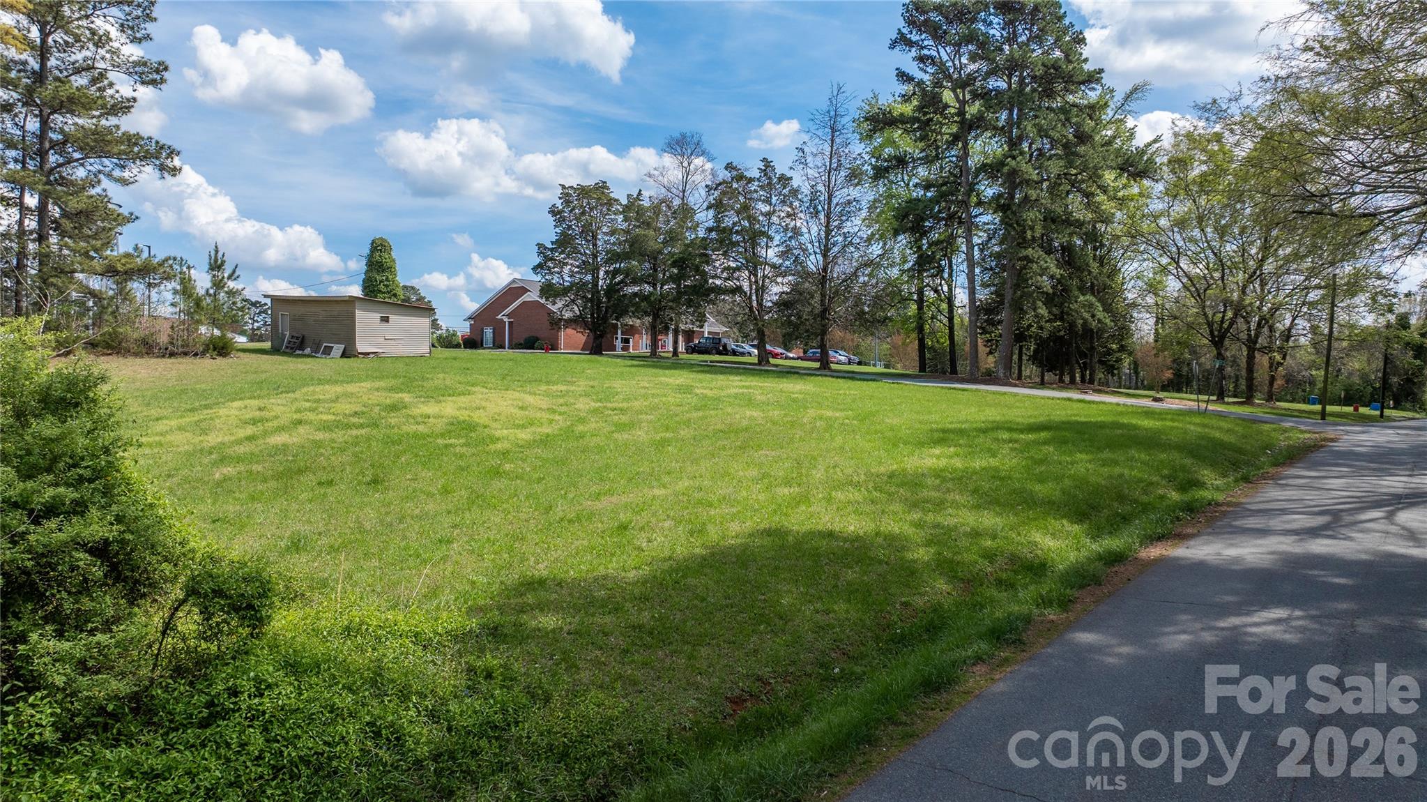 35 Varner Street Denton, NC 27239 - Photo 14 of 16 a view of a park with large trees