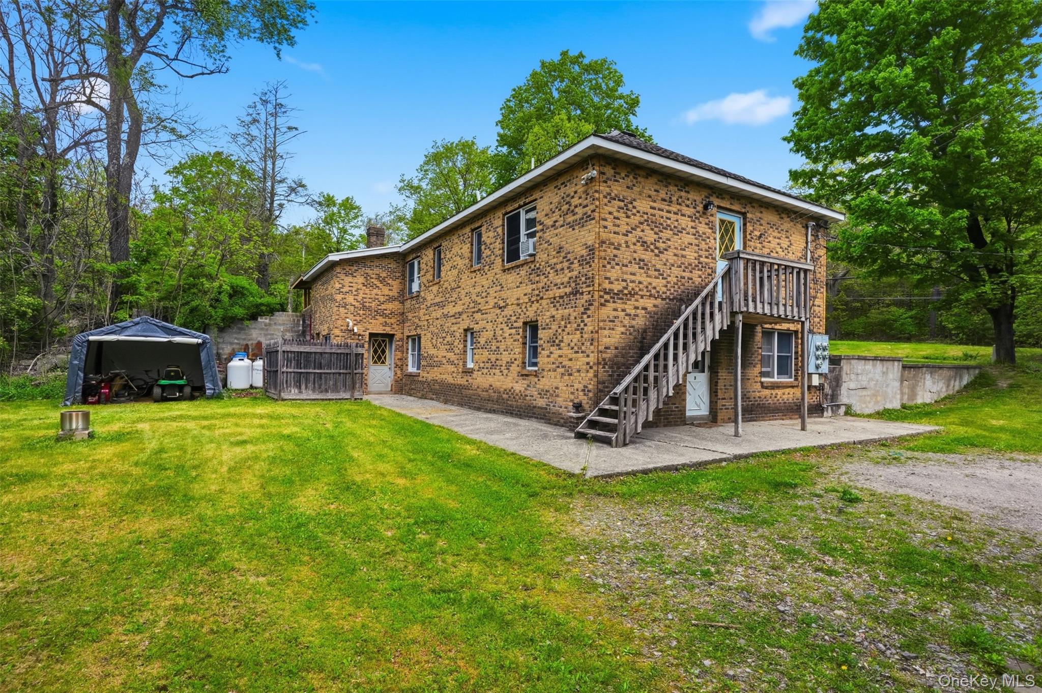 6 Short Road Wurtsboro, NY 12790 - Photo 6 of 48 a view of a house with a yard and sitting area