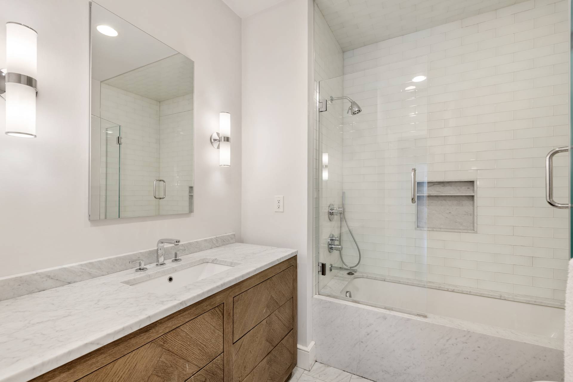Undisclosed Address Sag Harbor, NY 11963 - Photo 20 of 36 a bathroom with a tub sink shower and mirror