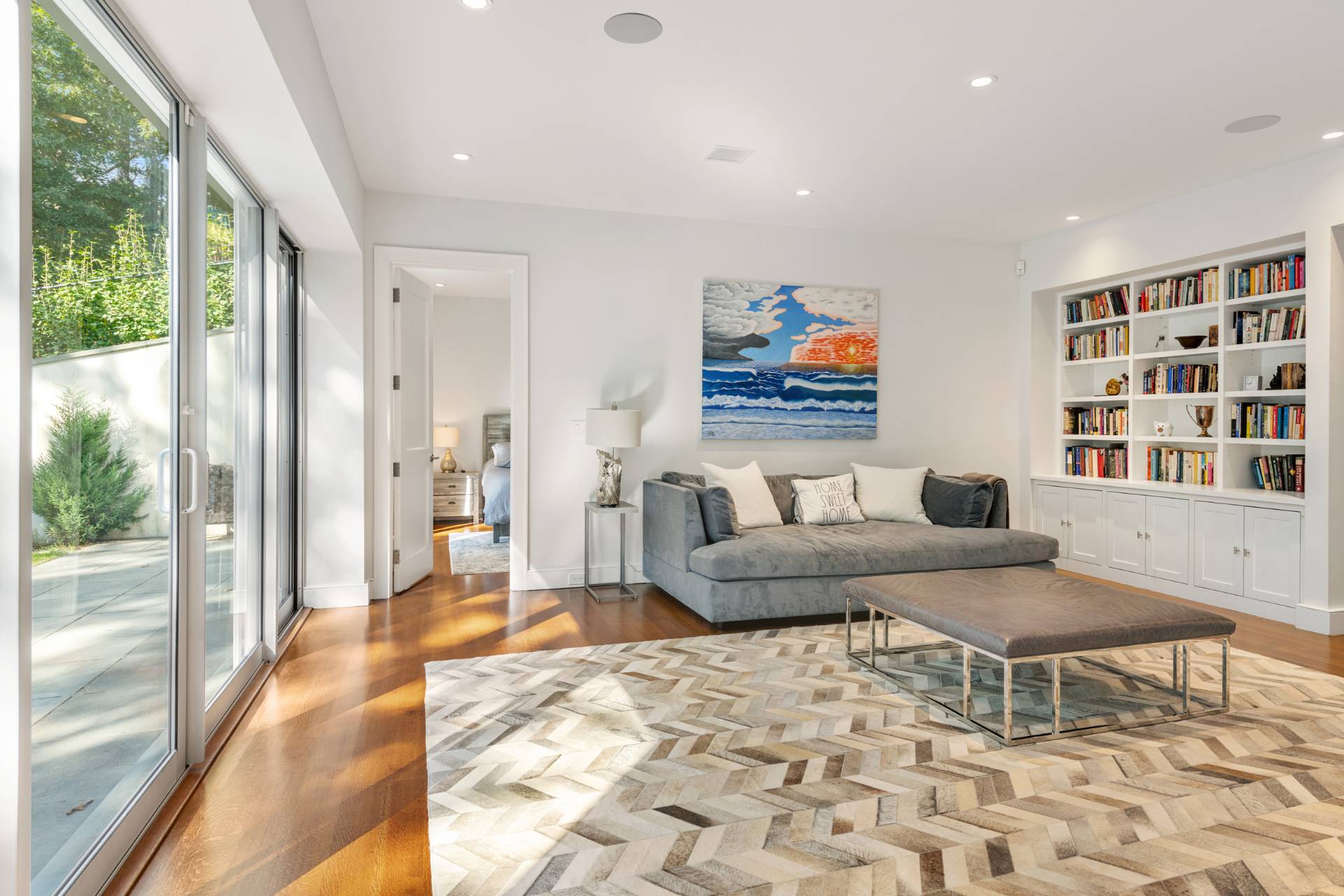 Undisclosed Address Sag Harbor, NY 11963 - Photo 24 of 36 a living room with furniture a rug and a large window