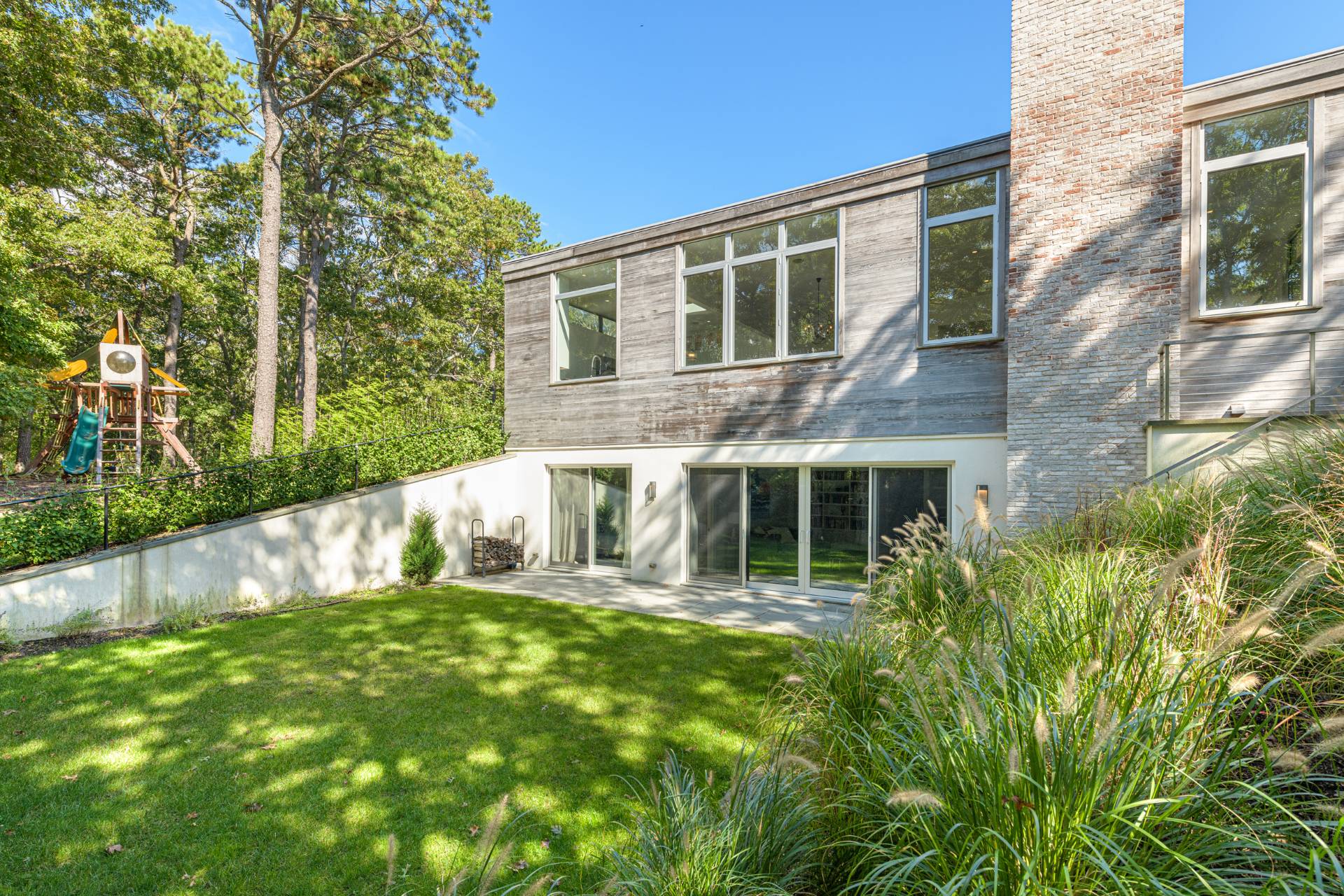 Undisclosed Address Sag Harbor, NY 11963 - Photo 33 of 36 a view of house with backyard and garden