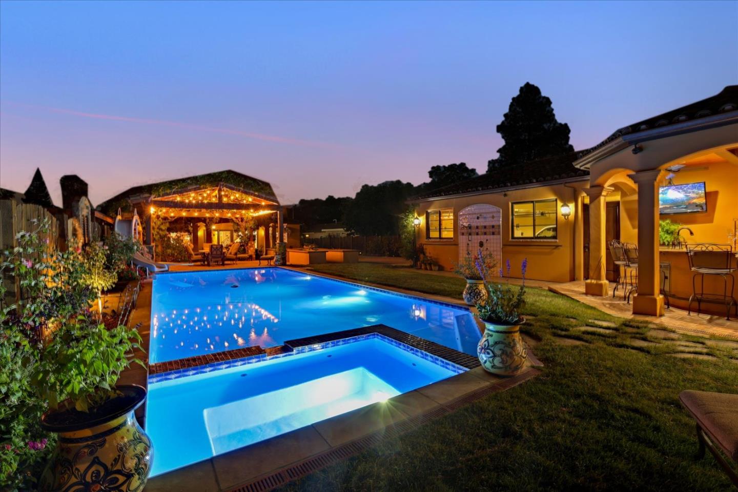 10091 Byrne Avenue Cupertino, CA 95014 - Photo 18 of 21 a view of a house with a swimming pool