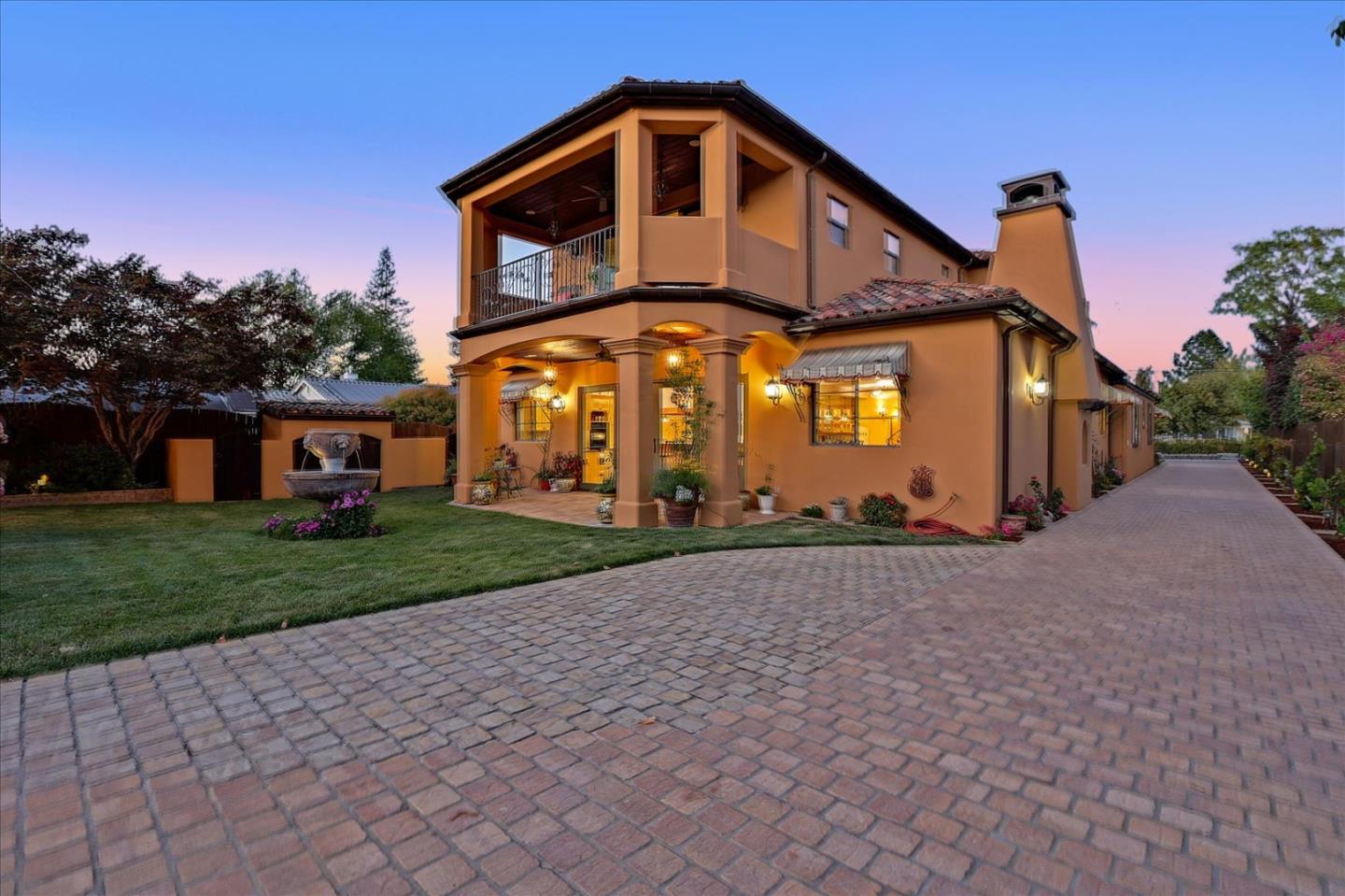 10091 Byrne Avenue Cupertino, CA 95014 - Photo 20 of 21 a front view of a house with a yard
