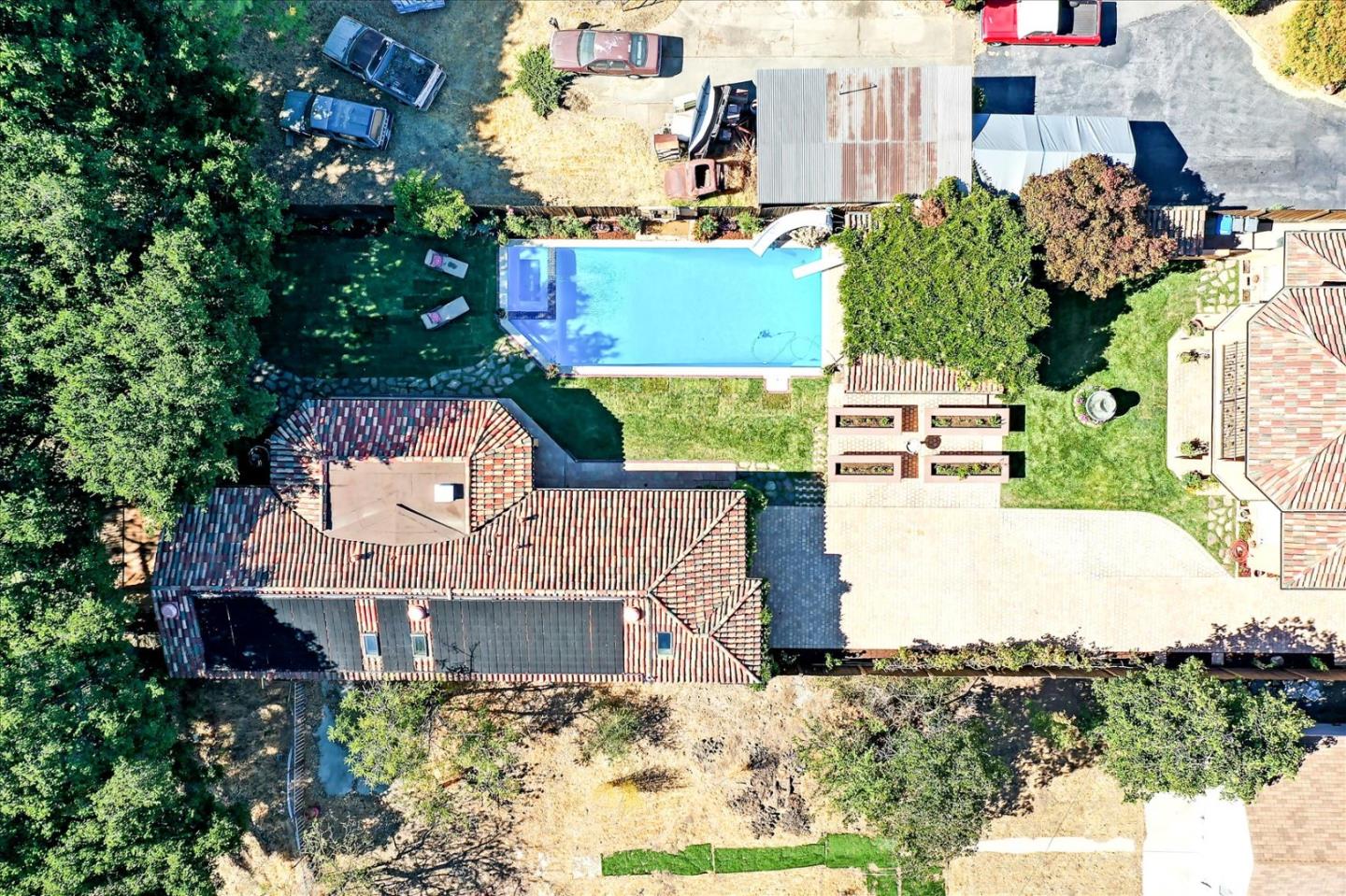 10091 Byrne Avenue Cupertino, CA 95014 - Photo 4 of 21 an aerial view of a house with a yard and lake view