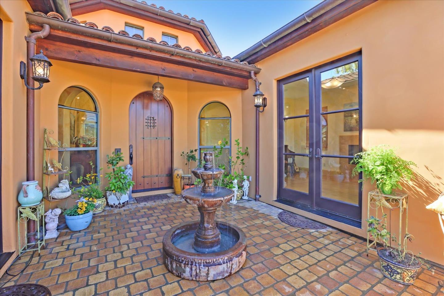 10091 Byrne Avenue Cupertino, CA 95014 - Photo 8 of 21 a living room filled with furniture