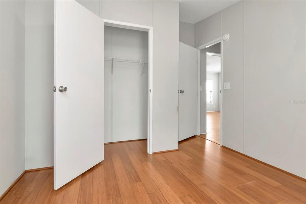 5213 R M D Avenue Plant City, FL 33566 - Photo 25 of 32 a view of an empty room with wooden floor