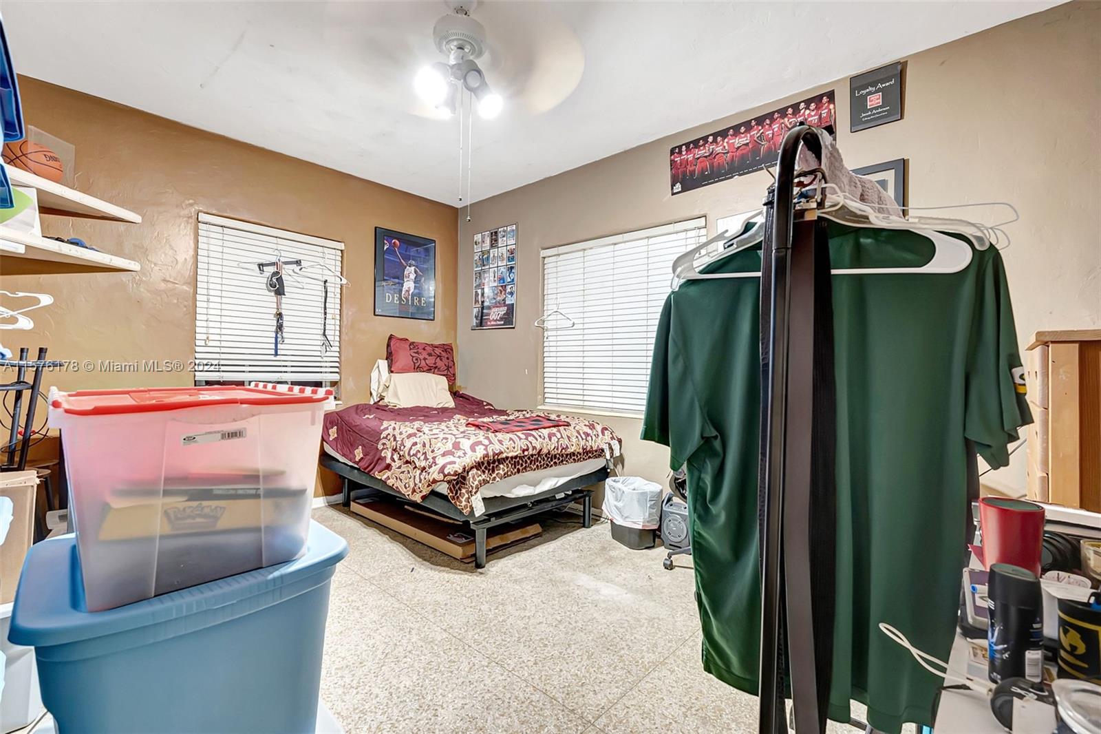 351 Southwest 22nd Road Miami, FL 33129 - Photo 16 of 27 a bedroom with a bed and a mirror