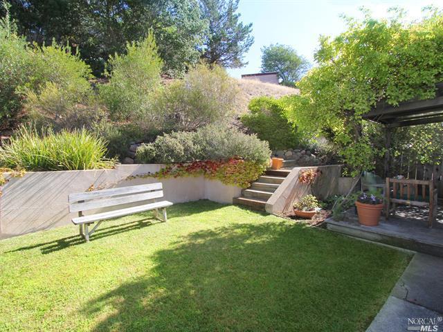 226 Alpine Street San Rafael, CA 94901 - Photo 1 of 1 Sunny, private back yard with pretty plantings, level lawn room to garden!