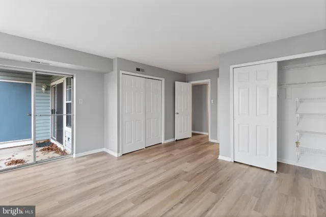 a view of a livingroom with wooden floor