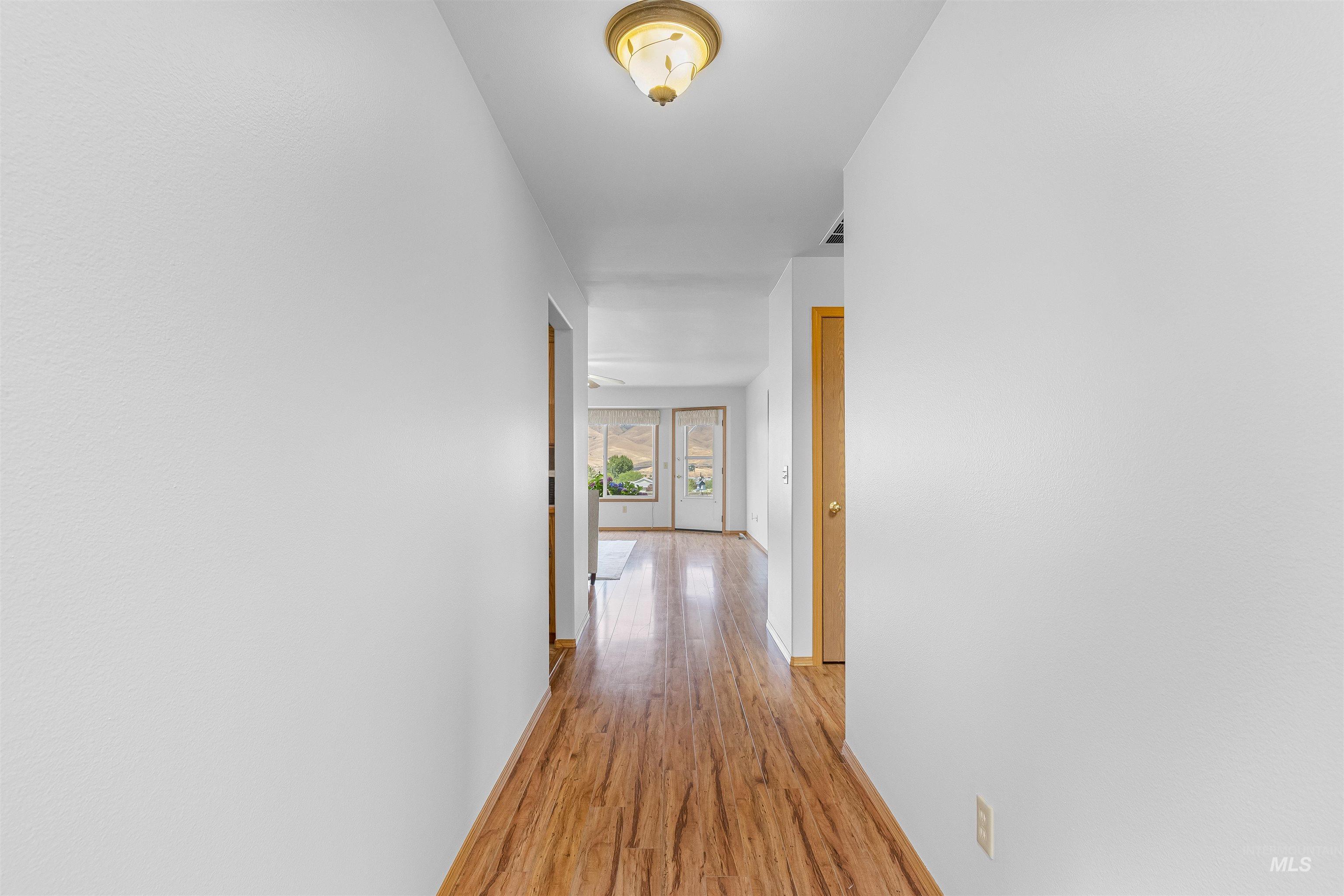 1409 29th Street Lewiston, ID 83501 - Photo 24 of 30 Hall featuring light wood-style floors and baseboards
