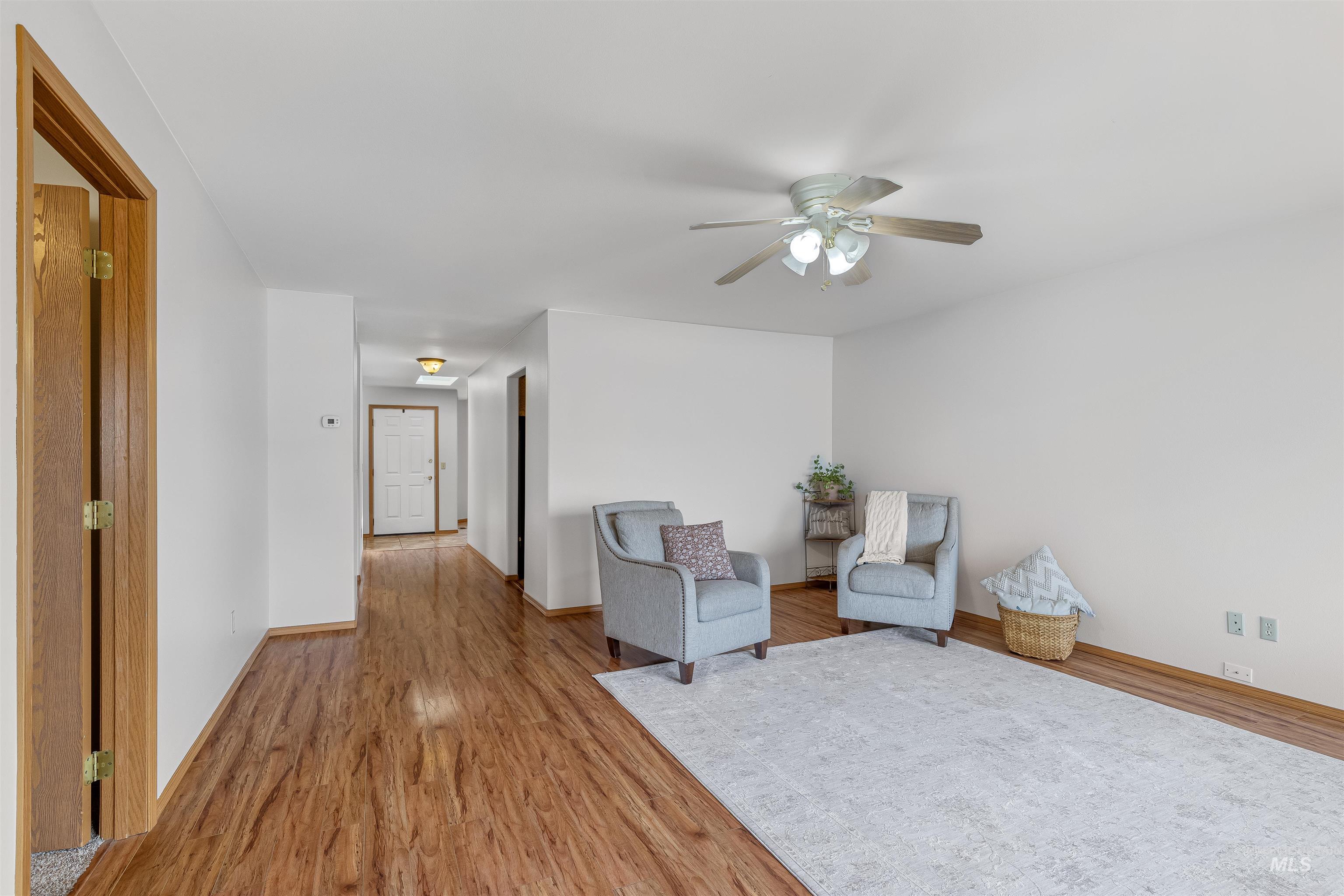 1409 29th Street Lewiston, ID 83501 - Photo 7 of 30 Sitting room featuring light wood-type flooring and ceiling fan