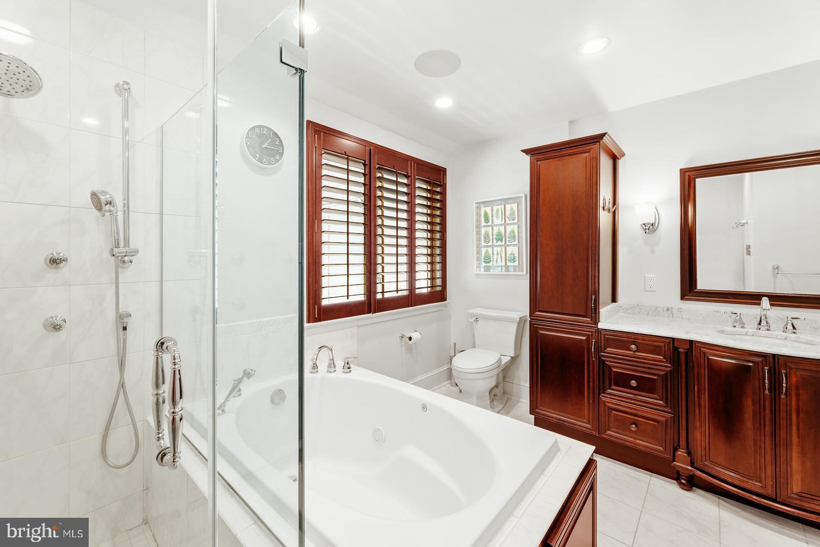 1700 Old Welsh Road Huntingdon Valley, PA 19006 - Photo 40 of 105 a bathroom with a tub sink and mirror