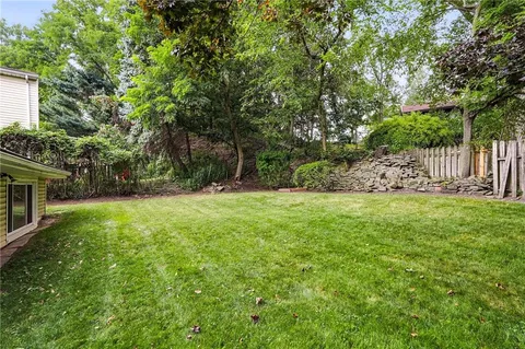 a view of a backyard with a garden