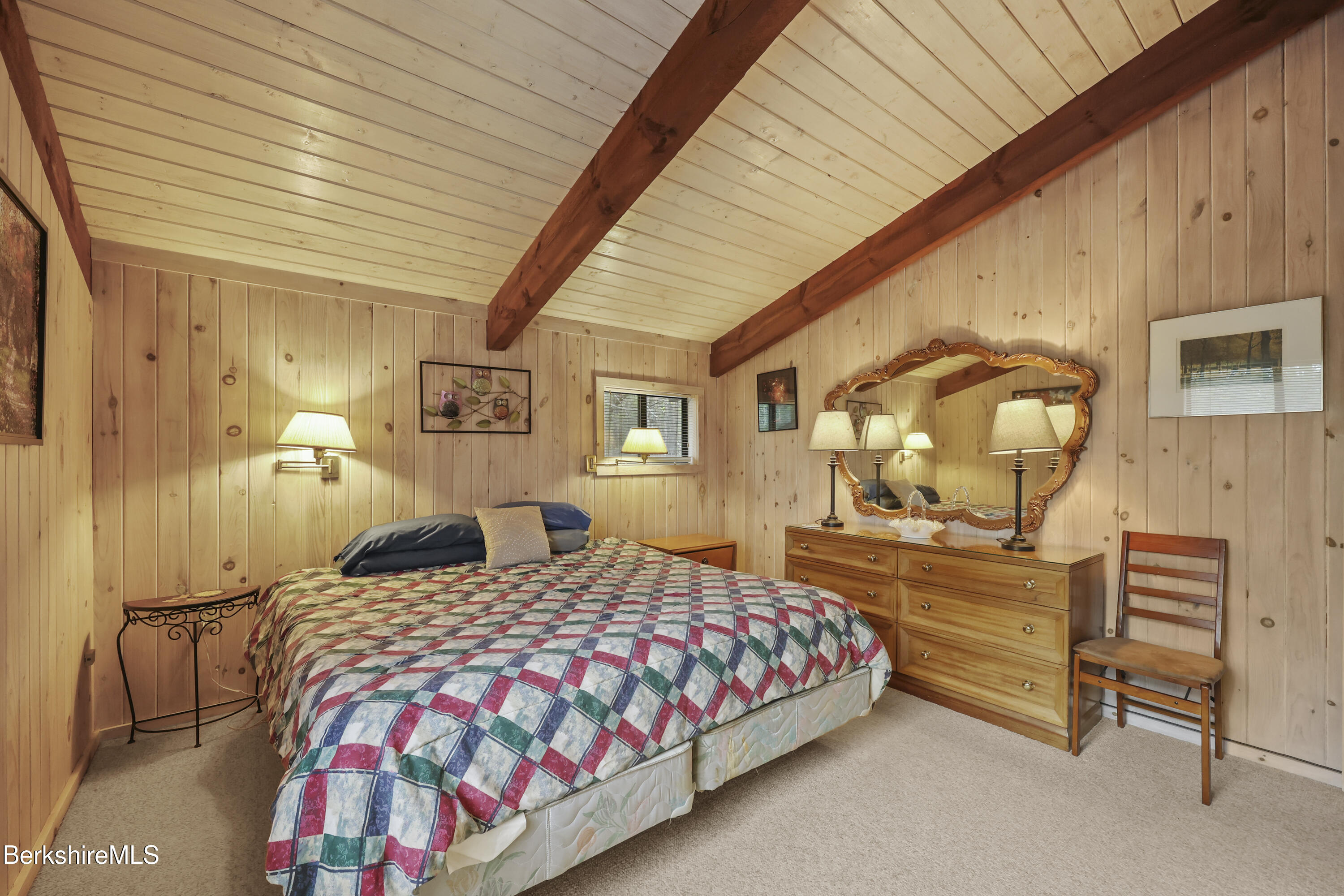 422 Bonny Rigg Hill Road Becket, MA 01223 - Photo 39 of 60 a bedroom with a bed and wooden floor