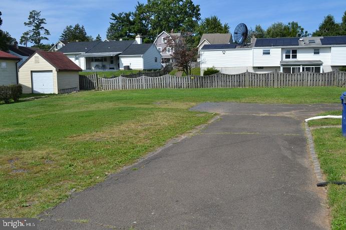 1664 Easton Road Willow Grove, PA 19090 - Photo 7 of 37 a view of a house with a big yard and large trees