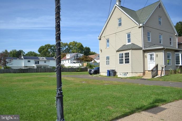 1664 Easton Road Willow Grove, PA 19090 - Photo 9 of 37 a front view of a house with a yard and trees