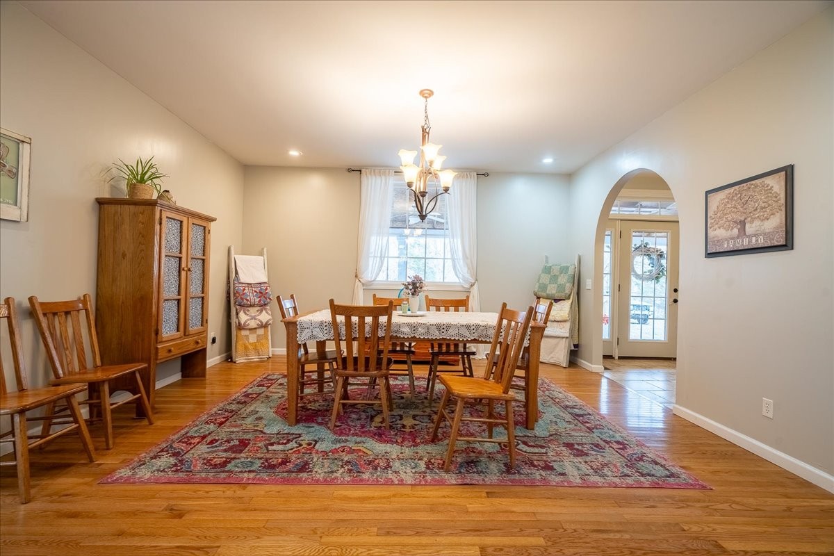 226 Nash Road Summertown, TN 38483 - Photo 12 of 55 a view of a dining room with furniture window and wooden floor