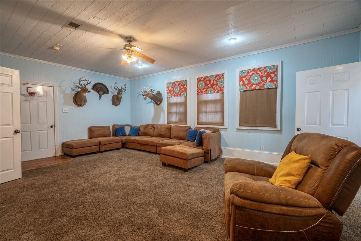 226 Nash Road Summertown, TN 38483 - Photo 25 of 55 a living room with furniture and a flat screen tv