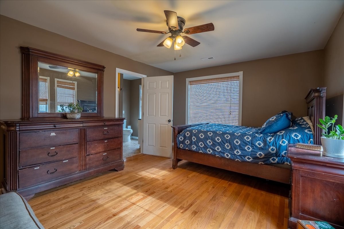 226 Nash Road Summertown, TN 38483 - Photo 28 of 55 a bedroom with a bed and a dresser