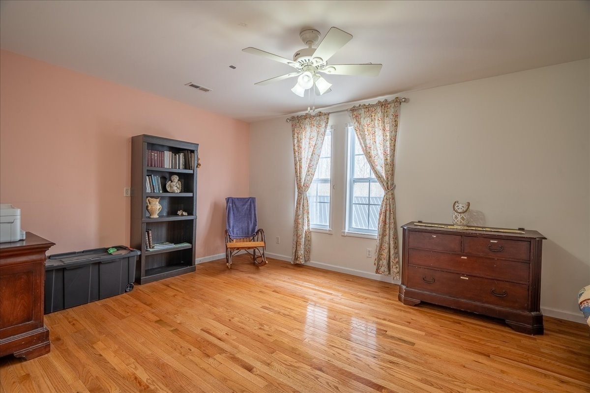226 Nash Road Summertown, TN 38483 - Photo 32 of 55 a room with a bed cabinets and window